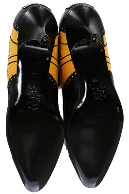 Lot 209 - A pair of Moschino taxi-cab shoes, 1990s