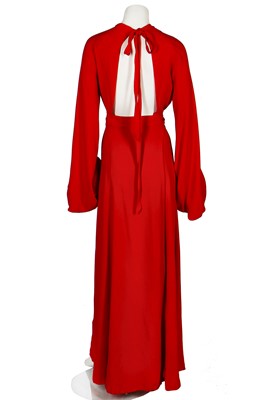 Lot 164 - An Ossie Clark red moss crêpe 'Cuddly' wrap-over dress, mid 1970s