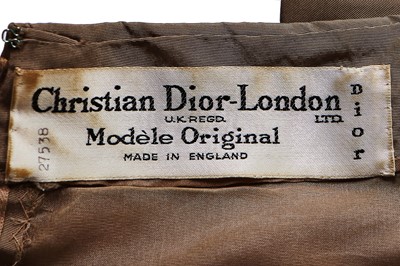 Lot 104 - A Christian Dior taupe faille cocktail dress, late 1950s