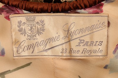 Lot 99 - A Compagnie Lyonnaise brown velvet opera coat,...
