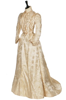 Lot 359 - An ivory damask bridal gown, American, 1900