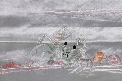 Lot 394 - A pair of ice-blue grey satin embroidered curtains, Japanese for the European market, circa 1900