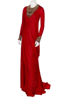 Lot 215 - An Alexander McQueen red jersey evening gown, 'Angels and Demons' collection, A/W 2010-11