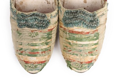 Lot 79 - A pair of brocaded silk mules, French, circa...