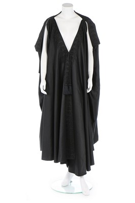Lot 101 - A Liberty & Co black satin burnouse cloak,...