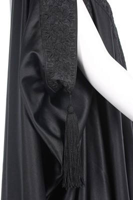 Lot 101 - A Liberty & Co black satin burnouse cloak,...