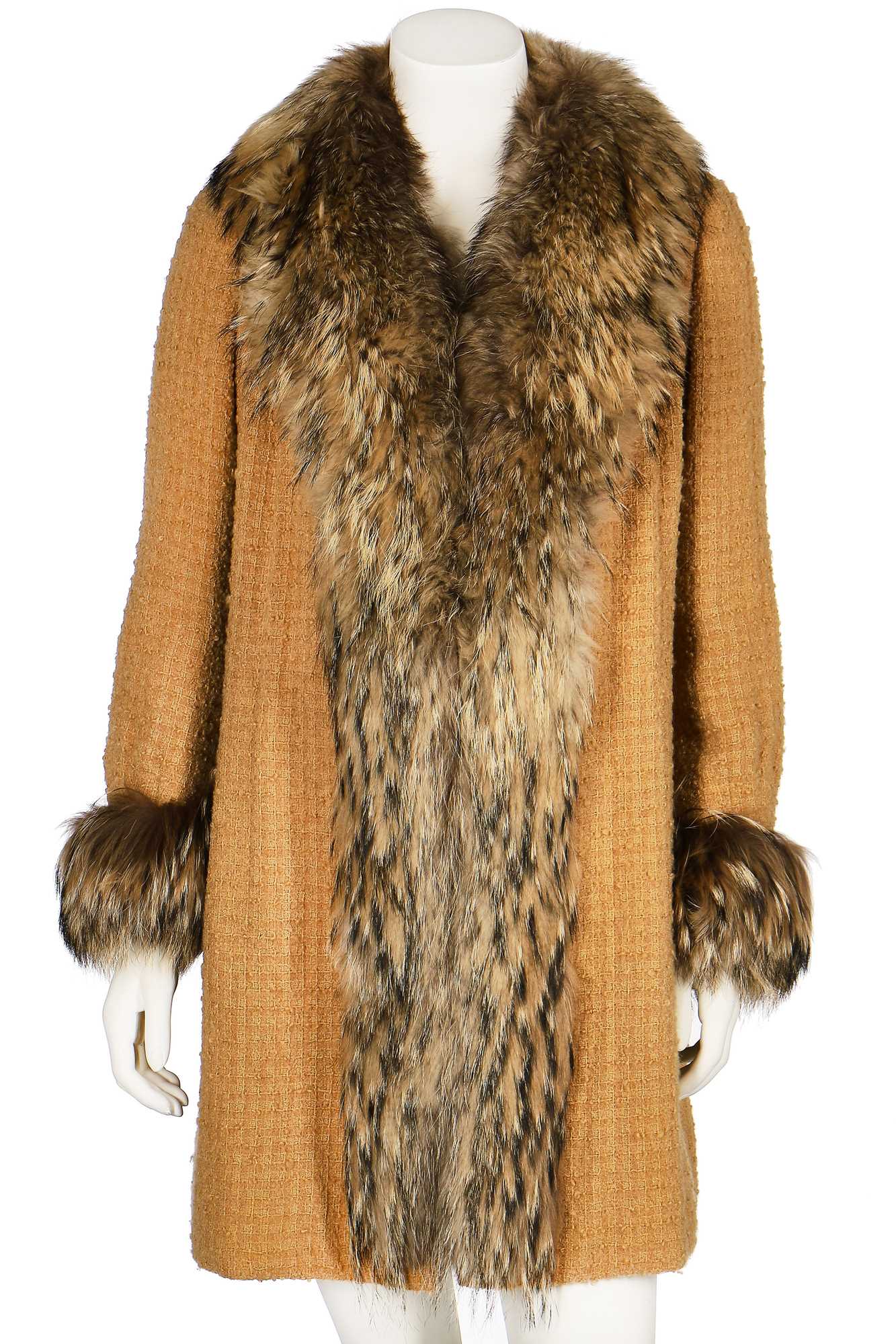 Click for high resolution Lot 16 - A Chanel couture yellow bouclé wool and fox fur coat, mid 1970s