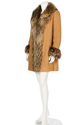 Lot 16 - A Chanel couture yellow bouclé wool and fox fur coat, mid 1970s