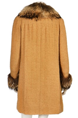 Lot 16 - A Chanel couture yellow bouclé wool and fox fur coat, mid 1970s