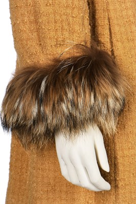 Lot 16 - A Chanel couture yellow bouclé wool and fox fur coat, mid 1970s