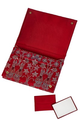 Lot 11 - A Cartier evening bag of Persian-style brocaded silk with 9ct gold frame, 1972