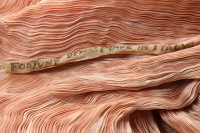 Lot 56 - A Mariano Fortuny pale peach silk Delphos, 1920-30