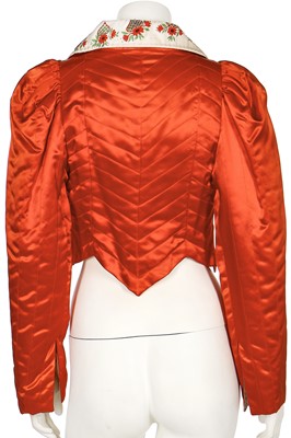 Lot 163 - An Ossie Clark/Celia Birtwell quilted red satin cropped jacket, circa 1972