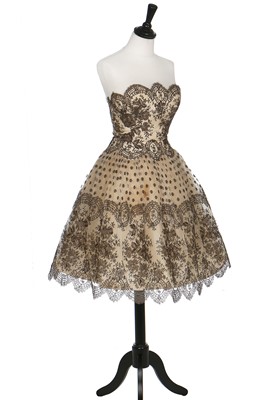 Lot 99 - A Chantilly lace cocktail dress, probably Lanvin-Castillo ready to wear, circa 1955