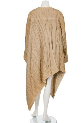 Lot 270 - An Issey Miyake rippled bark-effect asymmetric coat, Spring-Summer 1984