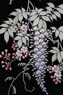 Lot 64 - A silk kimono finely embroidered with wisteria, Japanese for the European market, 1910-20