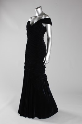 Lot 10 - A Victor Edelstein midnight-blue velvet evening gown