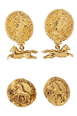 Lot 216 - A pair of Chanel gilt clip-on earrings with horse-shaped pendants, circa 1990