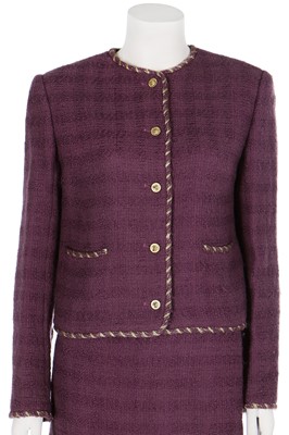 Lot 214 - A Chanel mauve bouclé wool suit, 1990s