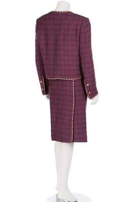 Lot 214 - A Chanel mauve bouclé wool suit, 1990s