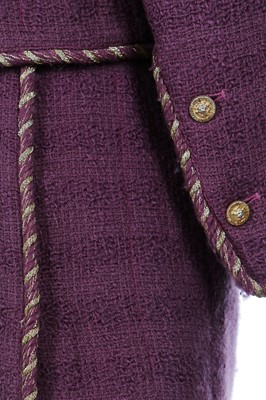 Lot 214 - A Chanel mauve bouclé wool suit, 1990s