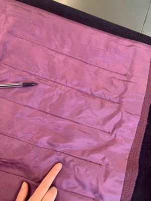 Lot 214 - A Chanel mauve bouclé wool suit, 1990s