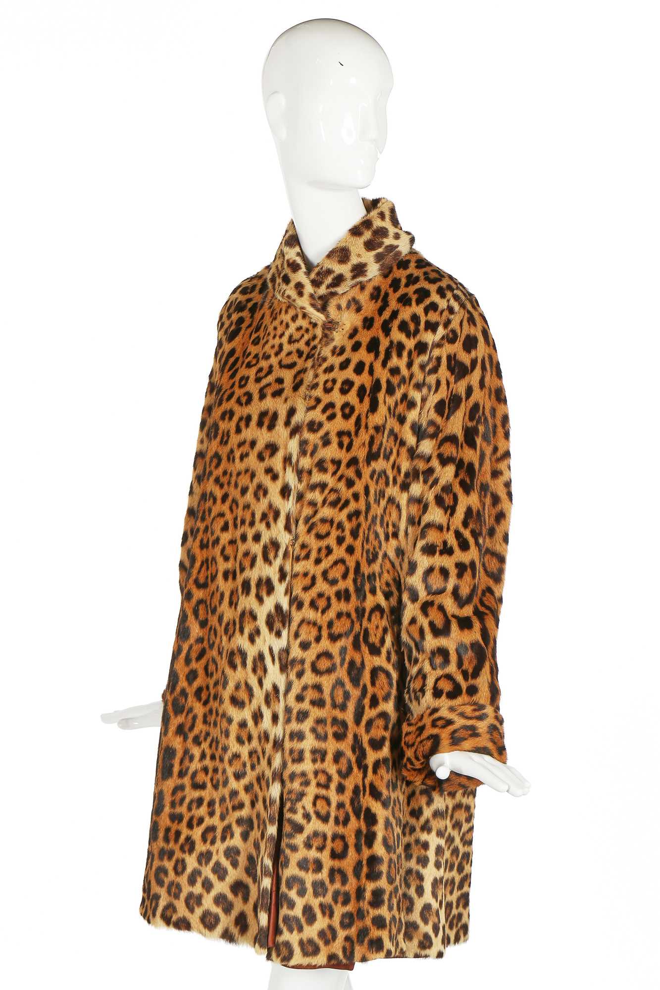 Lot 32 - A leopard skin coat, 1950s