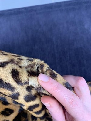 Lot 32 - A leopard skin coat, 1950s