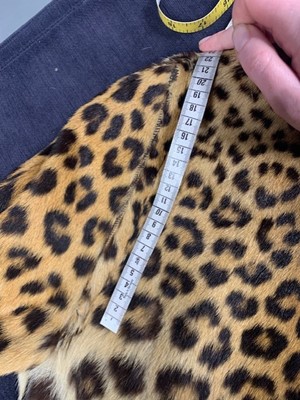 Lot 32 - A leopard skin coat, 1950s