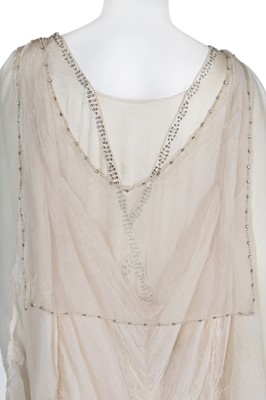 Lot 40 - A knitted silk jersey blouse with appliqued embellished panels, 1920s