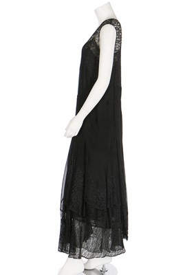 Lot 57 - A black chiffon evening dress with lace insertions, circa 1930