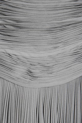 Lot 373 - A Madame Grès couture pleated dove-grey jersey evening gown, late 1940s-early 1950s