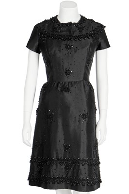 Lot 406 - A couture embellished black ottoman silk cocktail dress, possibly Balmain, circa 1960