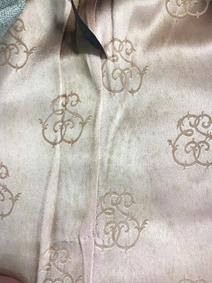 Lot 84 - A Schiaparelli flecked beige wool suit, circa 1950