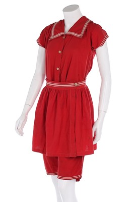 Lot 97 - A red wool-cotton bathing costume, circa 1910,...