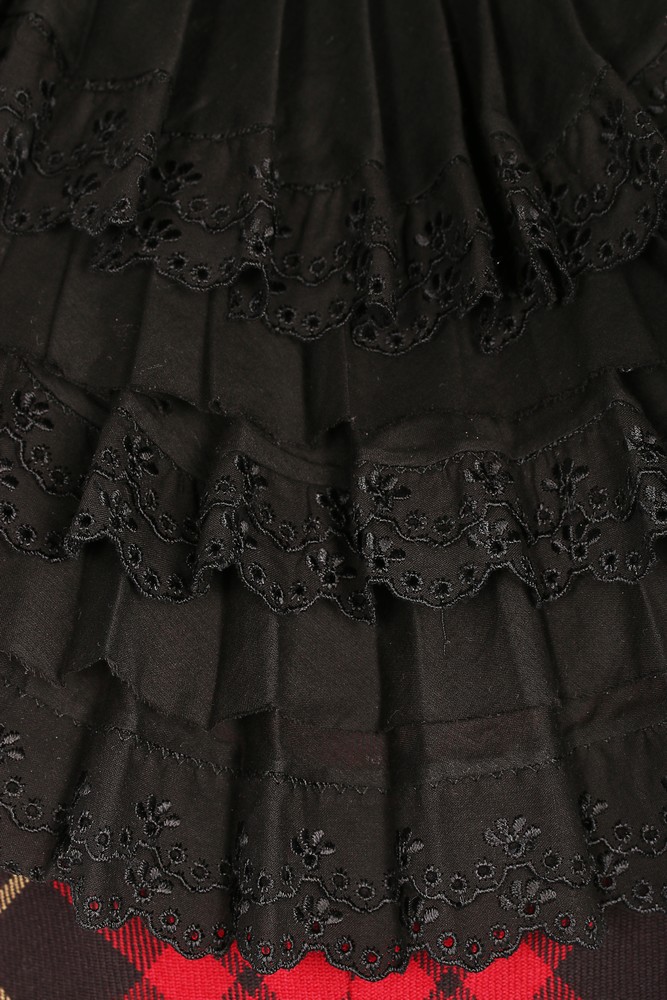 Lot 326 - An Alexander McQueen tartan wool dress,