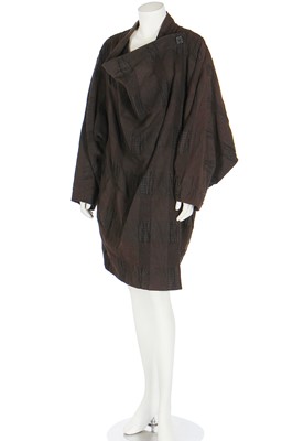 Lot 479 - An Issey Miyake textured brown cotton coat , circa 1987