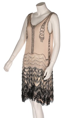 Lot 117 - A couture beaded oyster chiffon 'flapper'...