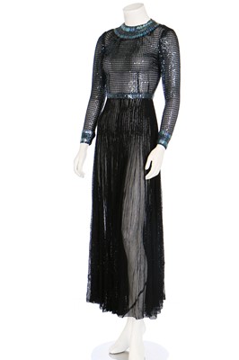 Lot 141 - A Paco Rabanne sequinned black mesh evening gown, circa 1970