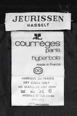 Lot 171 - A Courrèges black wool pinafore dress, French, circa 1970