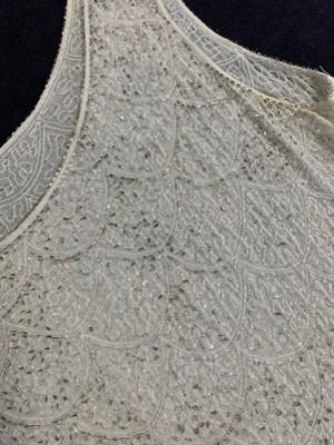 Lot 50 - A white muslin beaded flapper dress, circa 1928