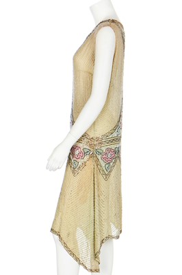 Lot 48 - A beaded pale yellow muslin flapper dress, circa 1925
