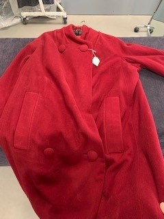 Lot 104 - A Christian Dior London berry-red wool coat, circa 1960