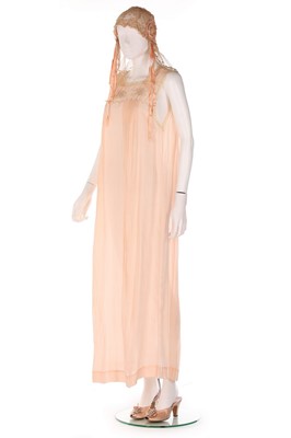 Lot 111 - A Nicole Groult peach satin dress, mid 1920s,...