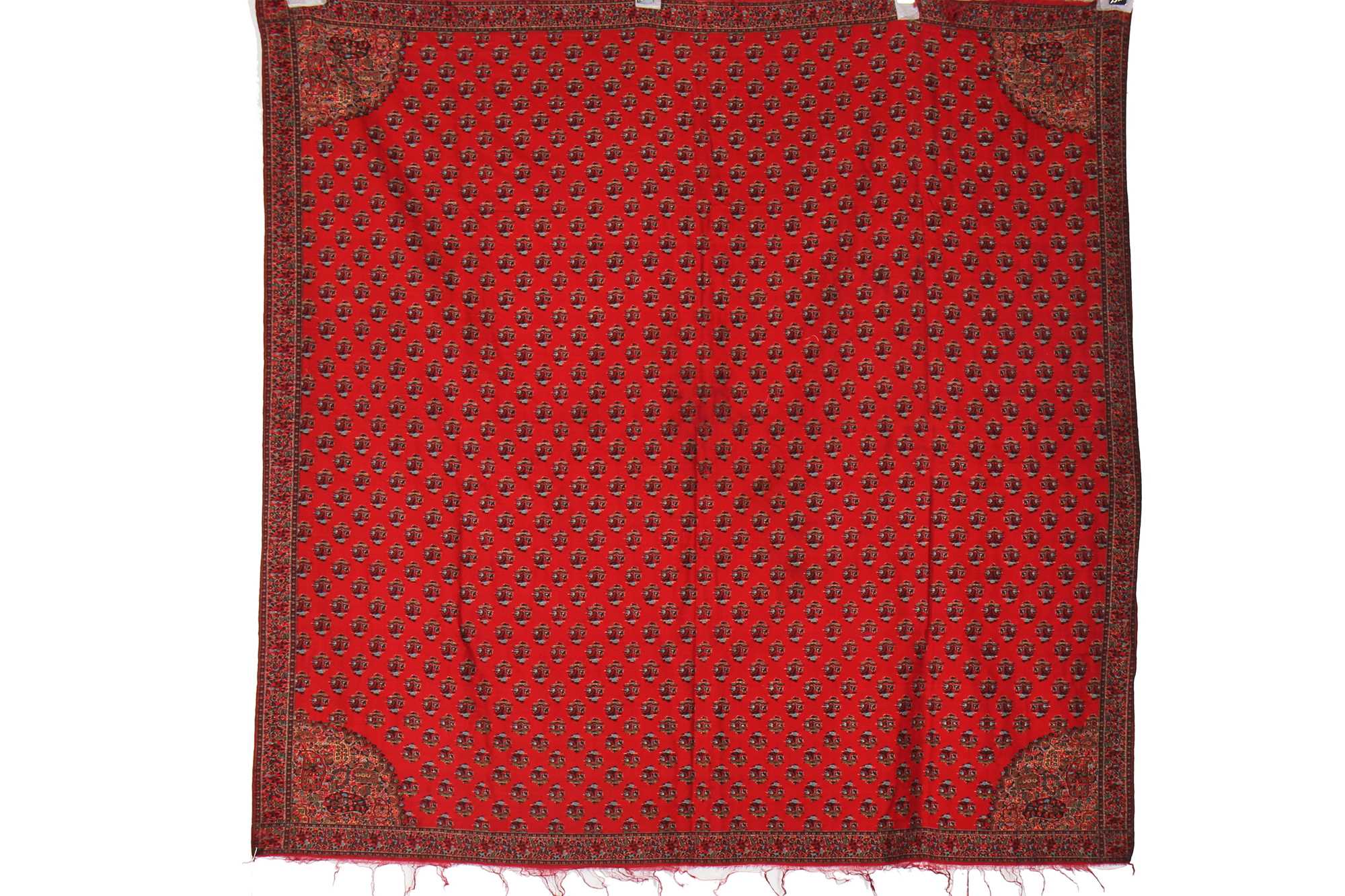 Lot 291 - A sprigged scarlet wool shawl, probably Paisley, 1830s