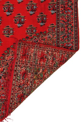 Lot 291 - A sprigged scarlet wool shawl, probably Paisley, 1830s