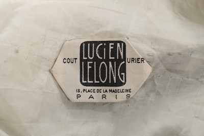 Lot 112 - A Lucien Lelong couture black silk faille...