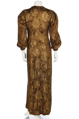 Lot 70 - Two good lamé evening gowns in shades of gold and brown, 1930s