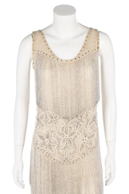 Lot 114 - A couture ivory chiffon beaded flapper dress,...