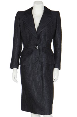 Lot 167 - An Yves Saint Laurent couture black brocatelle suit, circa 1985
